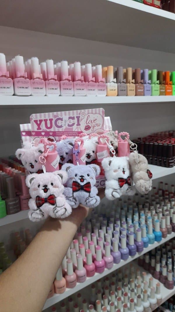 Lip gloss con llavero de osito YUCCI